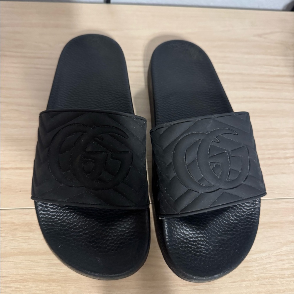 Not sure if they are real Gucci Embossed Black Slides